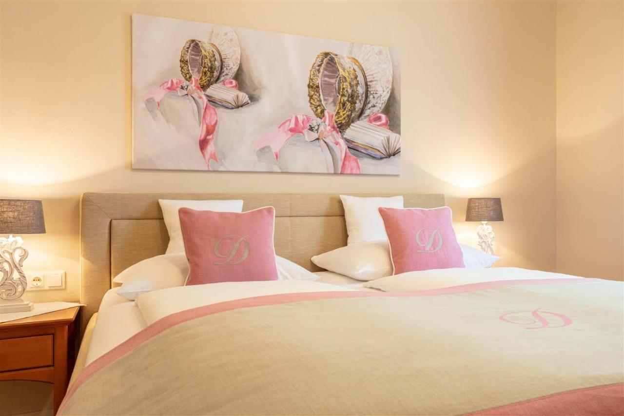 Donauhof - Hotel Garni ไวส์เซินเคียร์เชิน อินแดร์ วาคเอา ภายนอก รูปภาพ